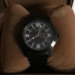 Men’s G-Timeless Gucci watch.